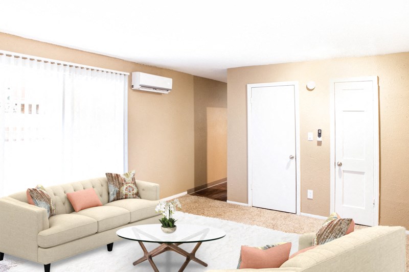 a living room with a couch and a coffee table