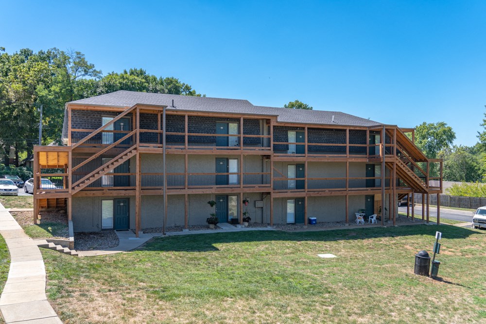 an exterior view of a house with a clear blue sky