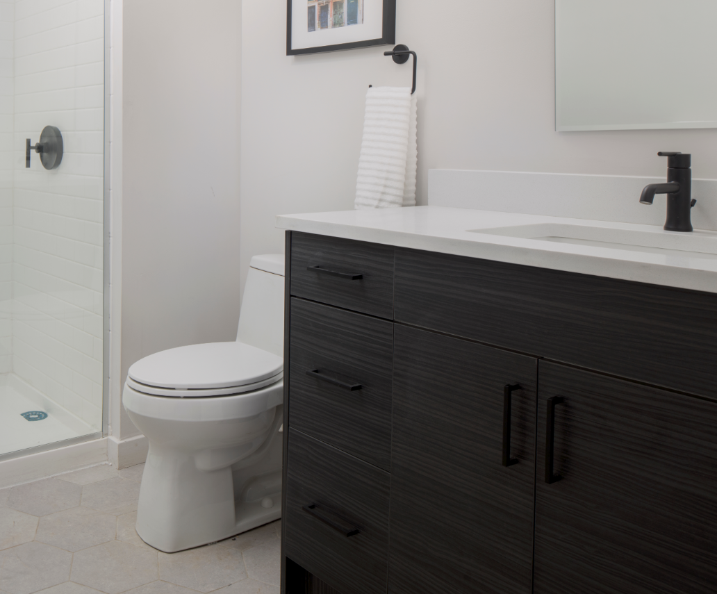 a bathroom with a toilet and a sink