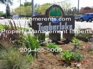 a sign for a trailblazer property management experts