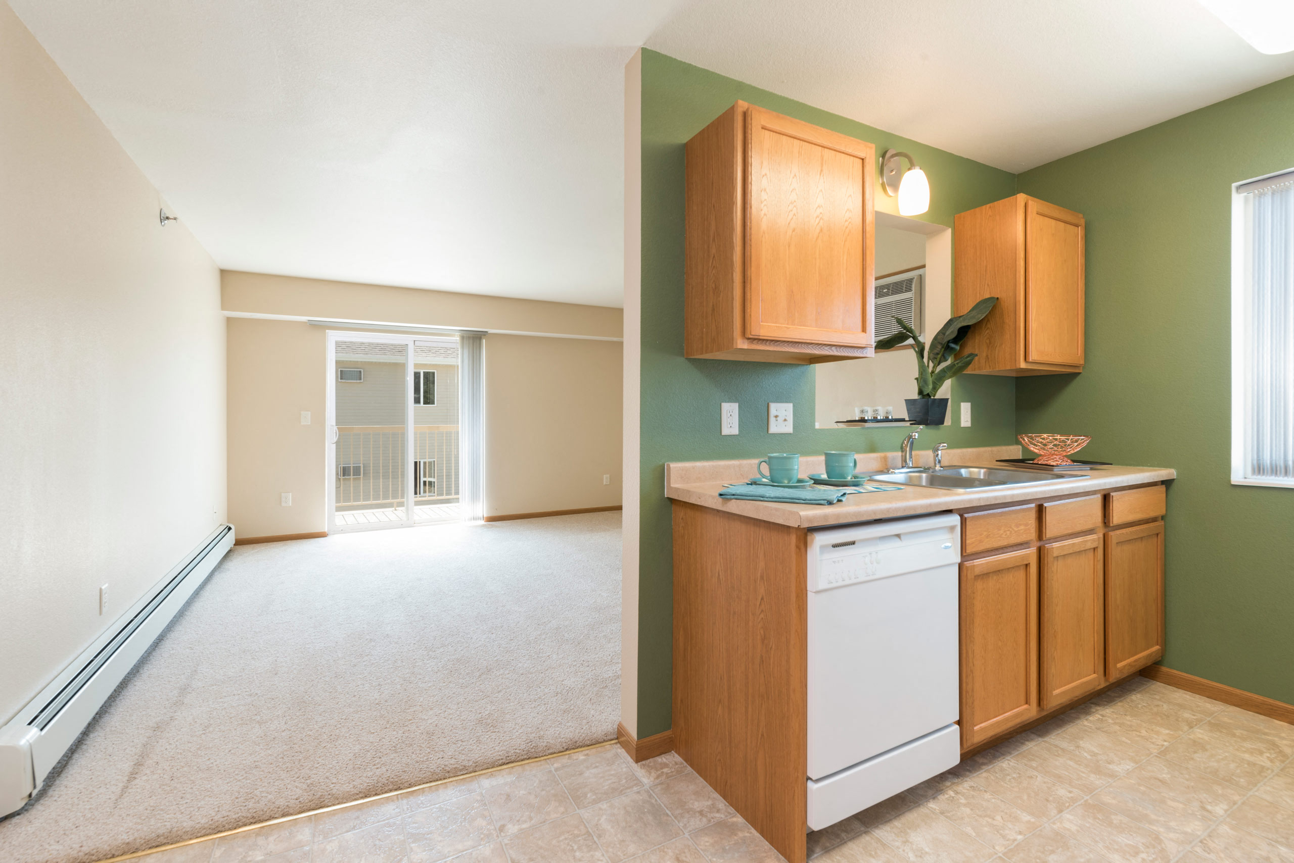 Sunset Ridge Apartments | 2 Bedroom | Kitchen & Living Room
