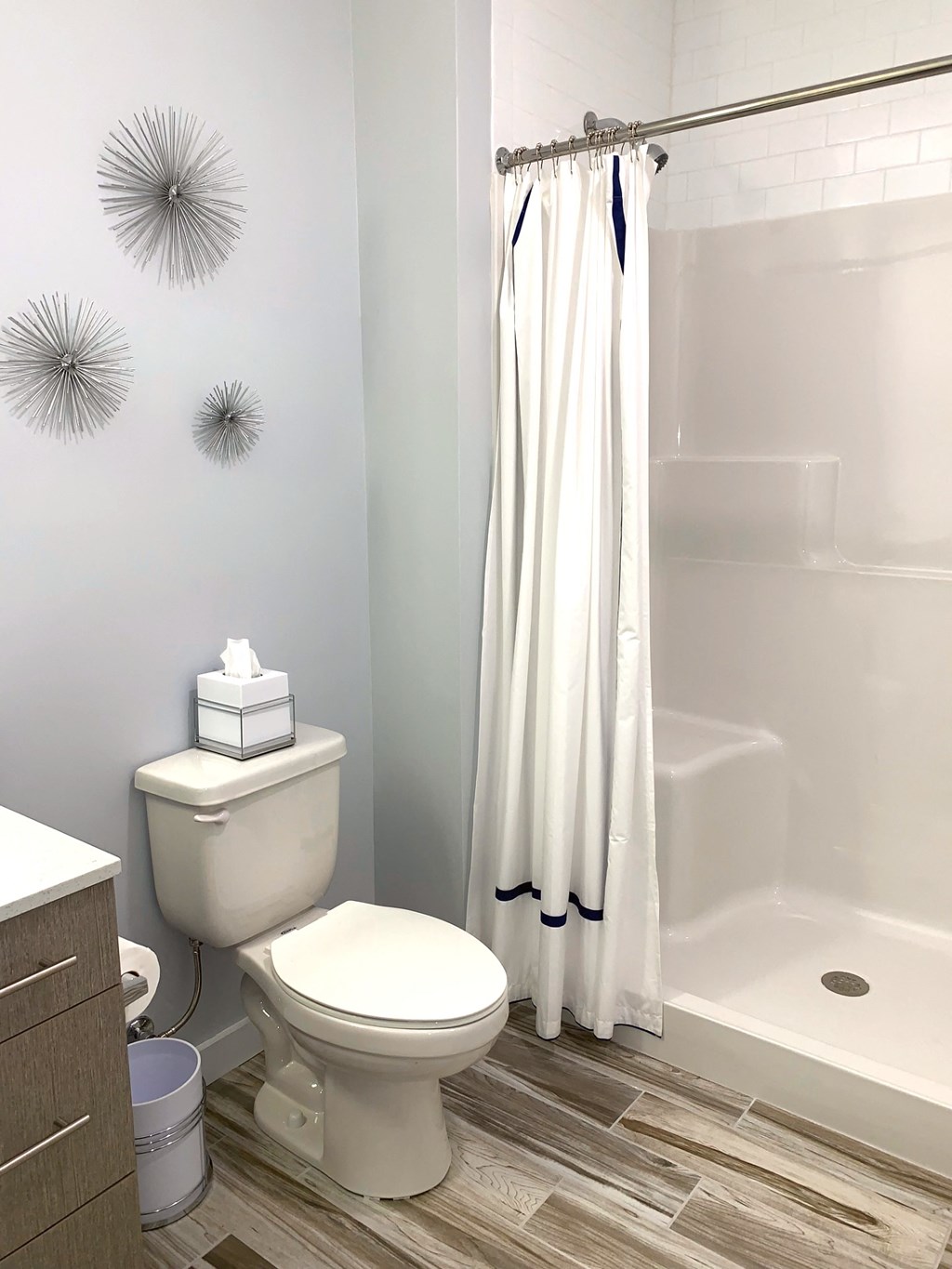 a small bathroom with a toilet and a shower