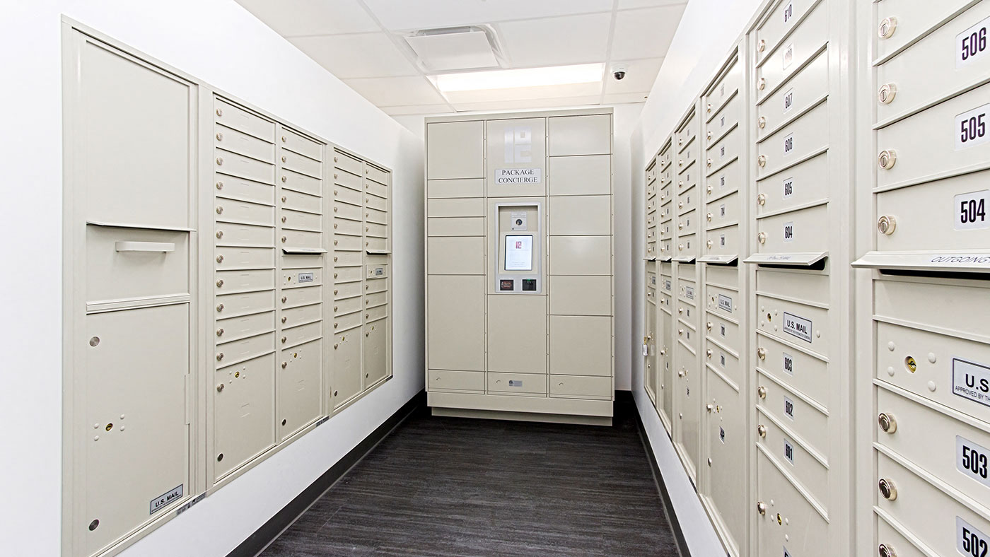 a long room filled with lockers and directories
