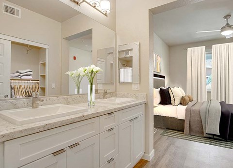 Bathroom with bed view  l Silverado Apartments in Sparks NV