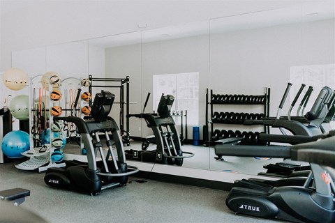 a gym with weights and other exercise equipment