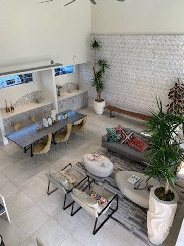 a living room with a table and a couch