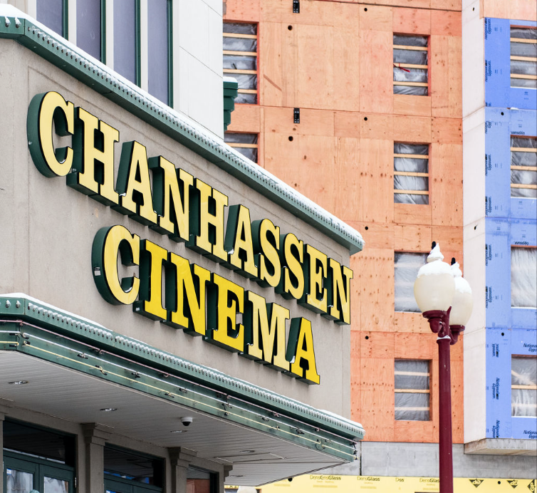 the sign for the chanhassen cinema on the side of a building