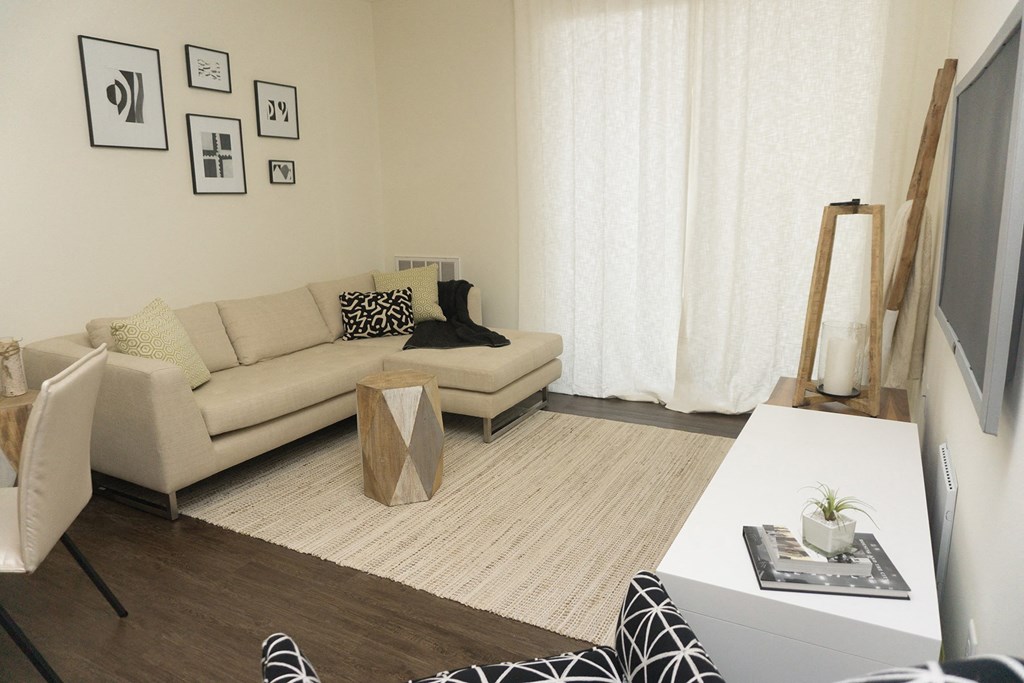 a living room with a couch and a table