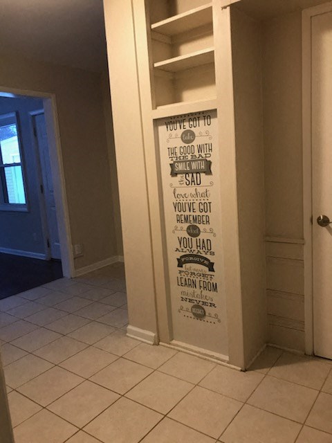 a wall with a wall quote on a wall