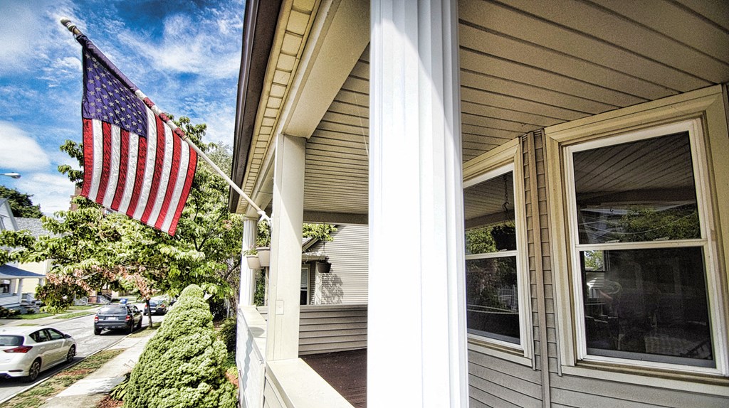 an flag on the side of a house