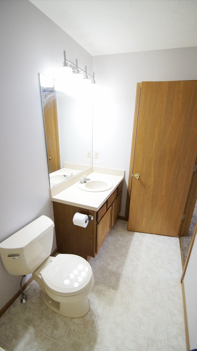 a small bathroom with a toilet and a sink