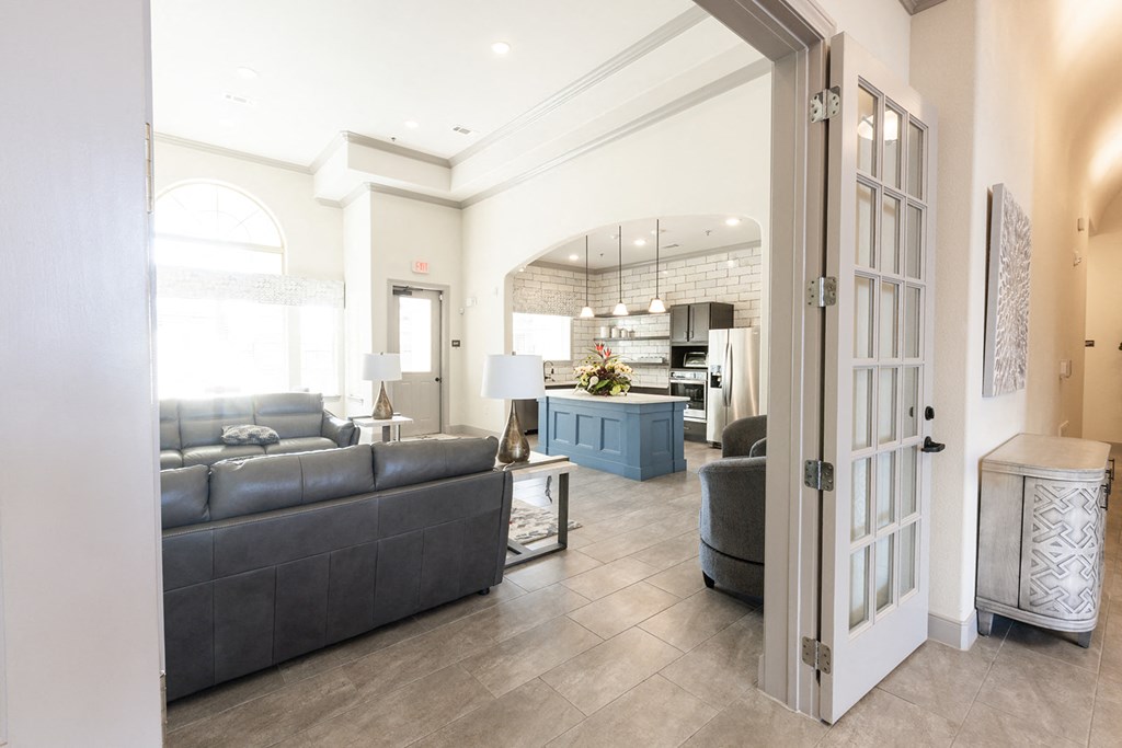 a living room with couches and a table