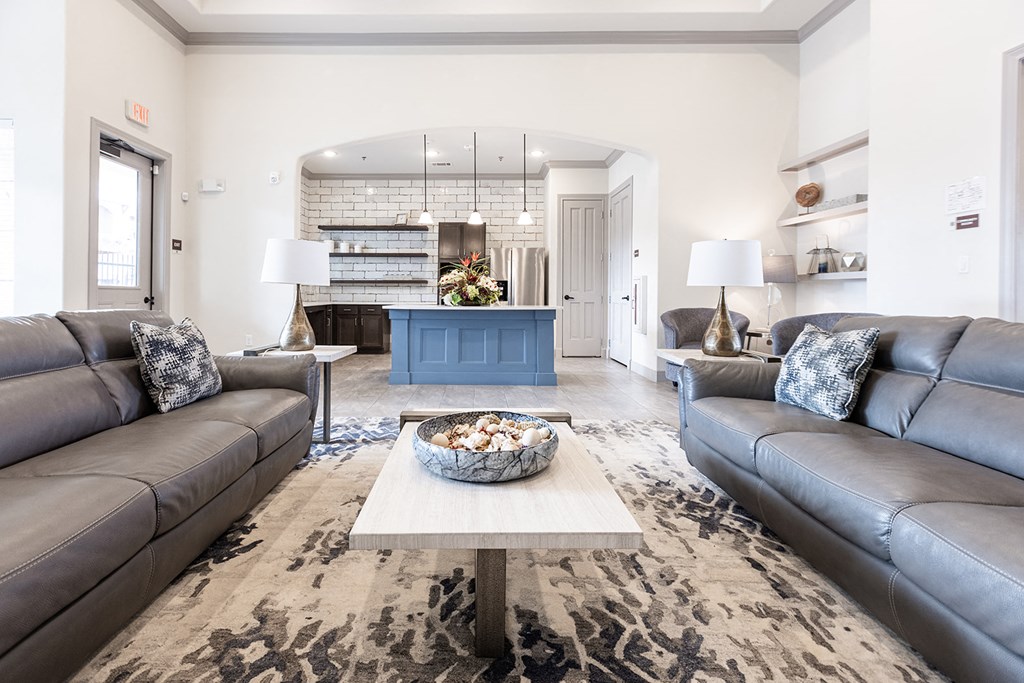 a living room with couches and a coffee table