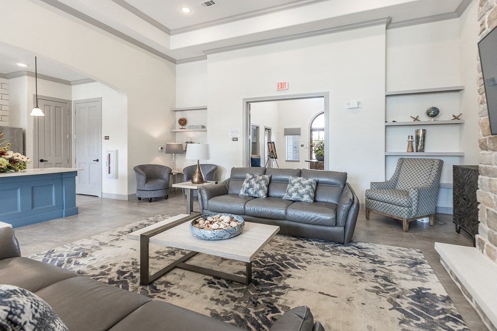 a living room with couches and a coffee table