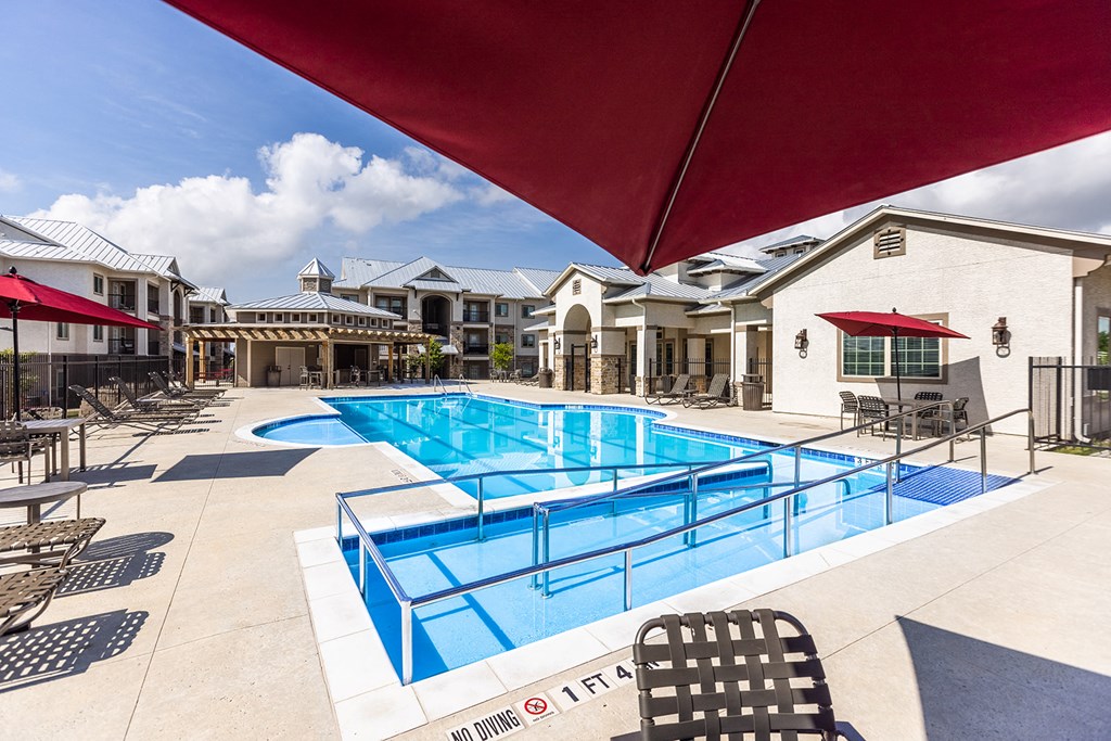 our resort style pool is next to our apartments at the estates