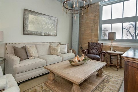 a living room with a couch and a table