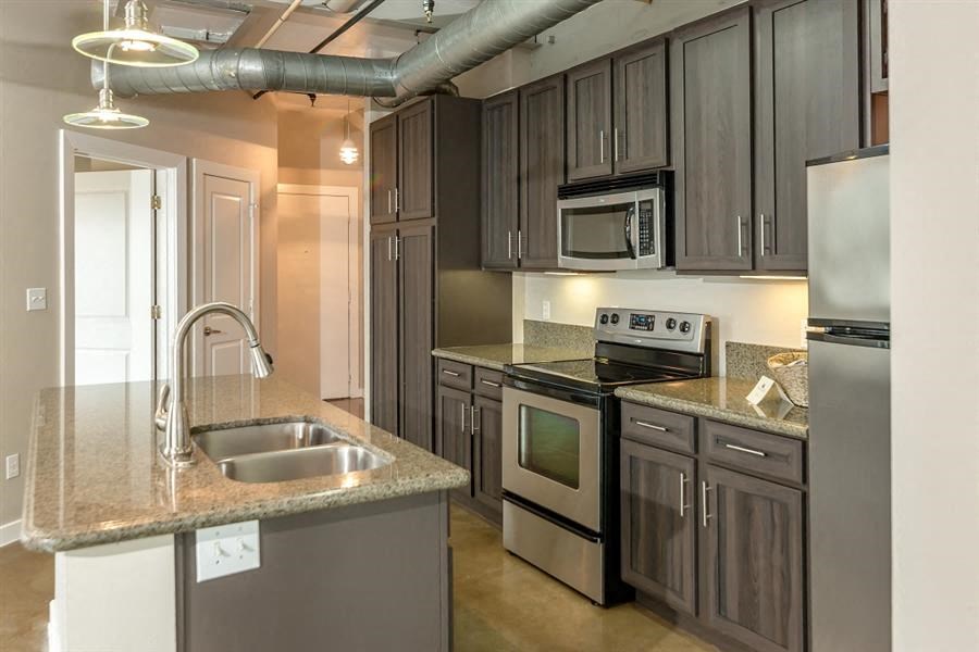 Spacious Kitchen with Pantry Cabinet at The Landmark, New Braunfels, Texas