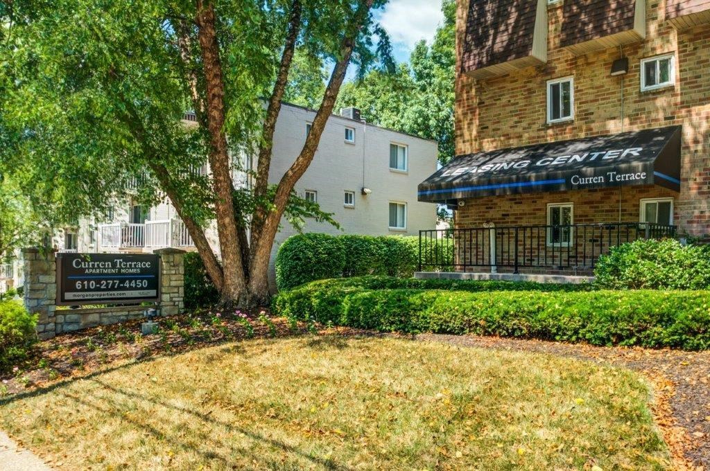 an apartment building with a sign for the center center center terrace apartments