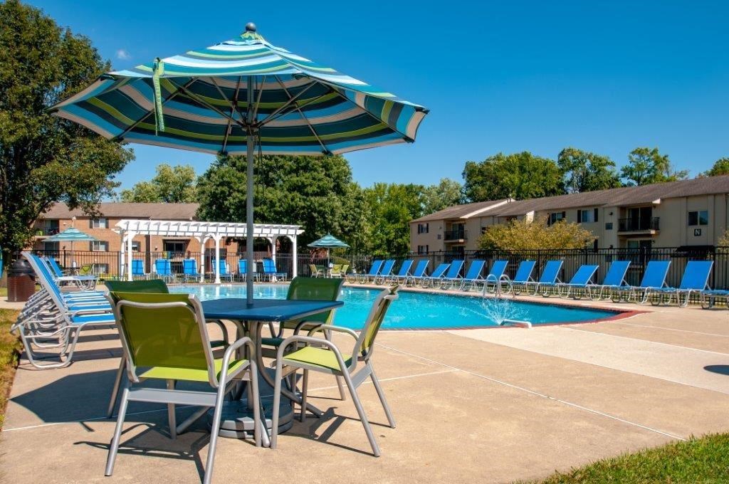 our apartments have a pool and chairs and umbrellas
