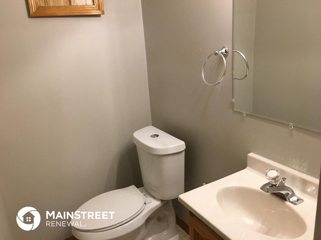 a small bathroom with a toilet and a sink