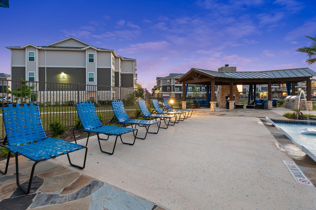 the preserve at ballantyne commons pool and lounge chairs with apartment buildings