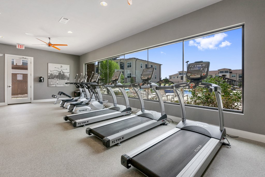 San Marcos, TX Apartments for Rent - Radiate Fitness Center with treadmills, ellipticals, free weights, and more