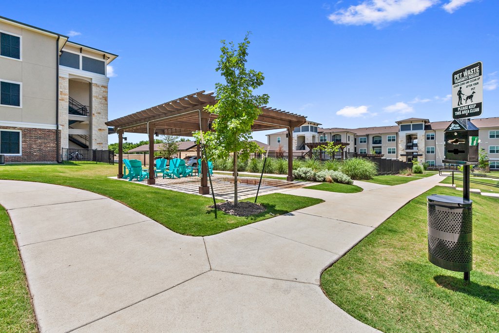 the preserve at ballantyne commons walkway to outdoor amenities with picnic area