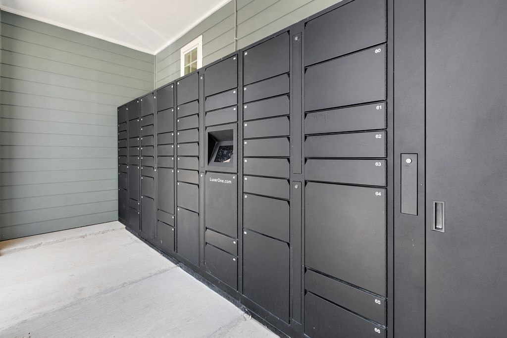 a bunch of lockers in a room with a white floor