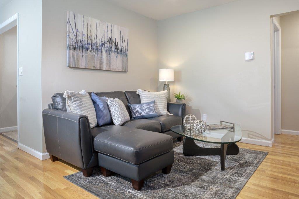 a living room with a couch and a coffee table