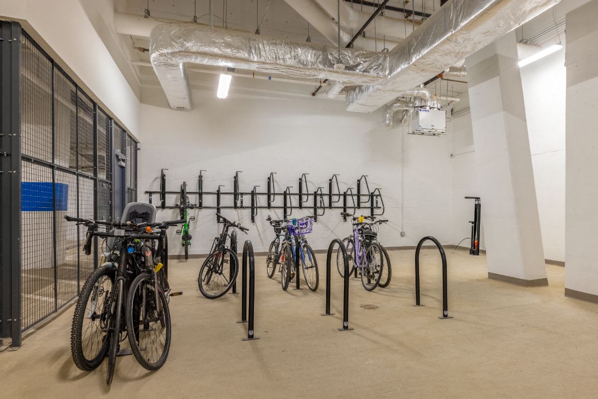 the store has several bikes parked on racks