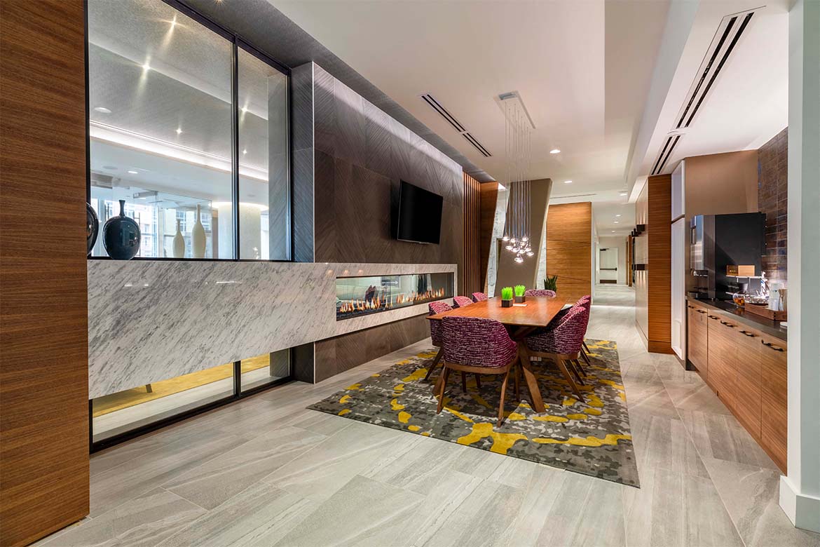 a dining room with a table and chairs