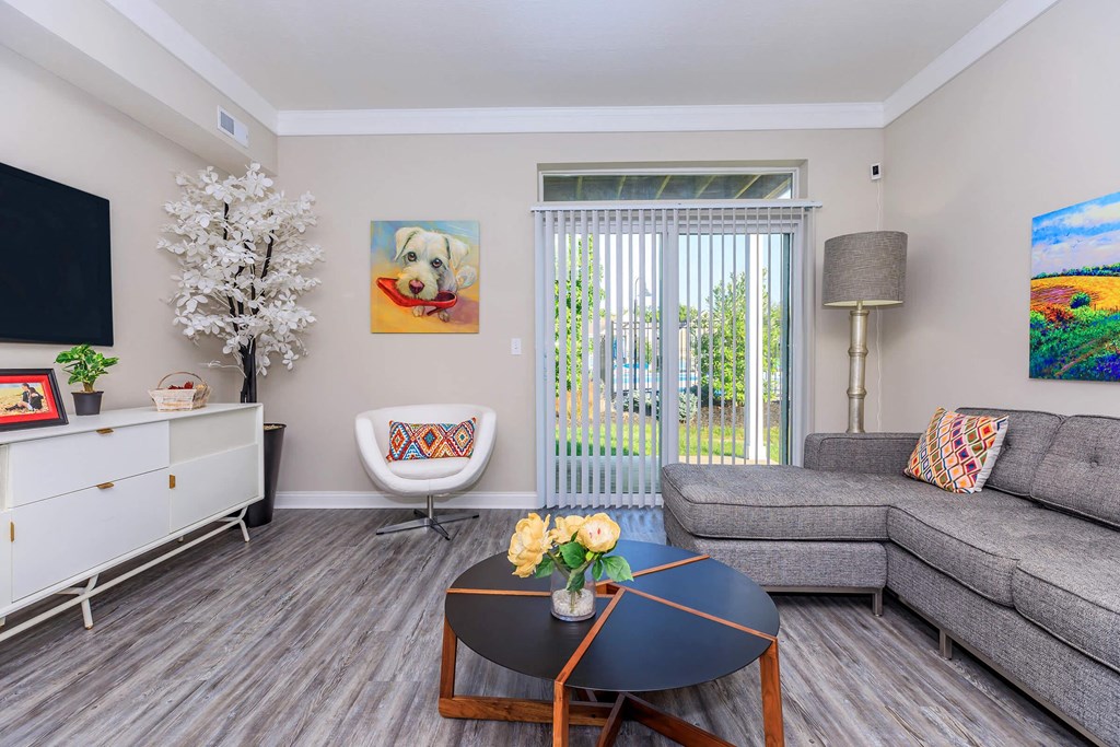 a living room with a couch and a table