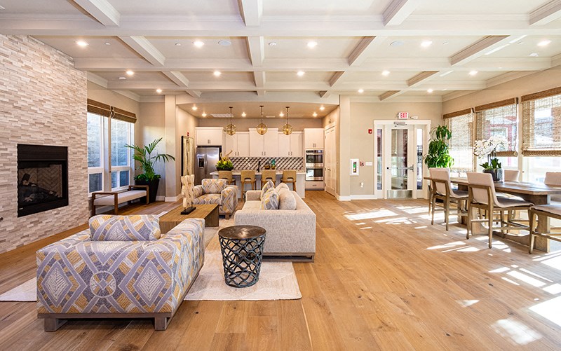 Townhomes for Rent in American Canyon - The Village at Vintage Ranch - Clubhouse with Fireplace, Kitchen, and Seating Area