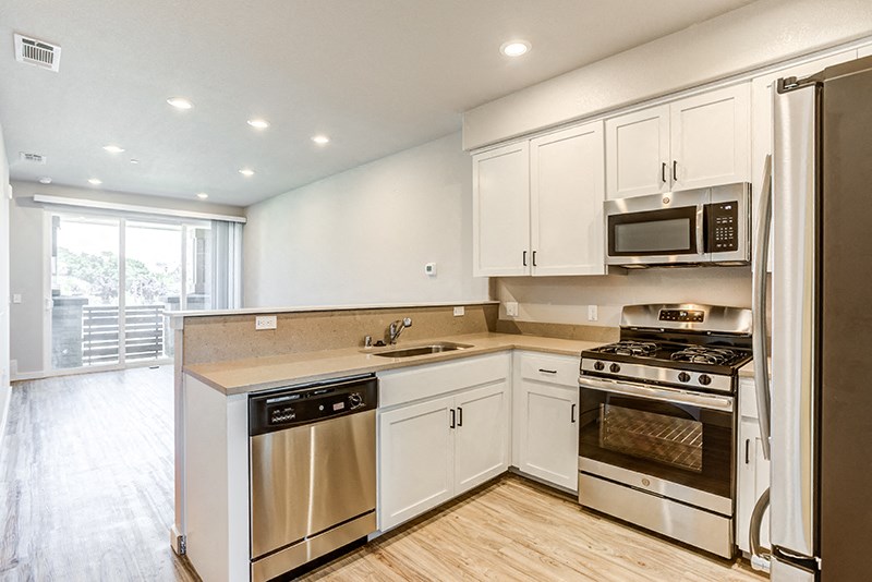 Apartments for Rent in American Canyon- The Village at Vintage Ranch- Stainless-Steel Appliances with White Cabinets and Wood-Style Floors
