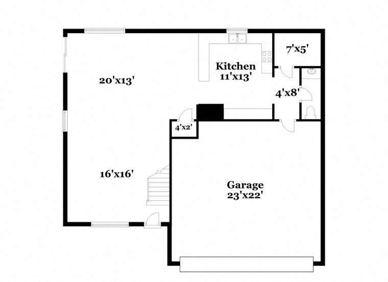 a floor plan of a house with a small kitchen and a garage