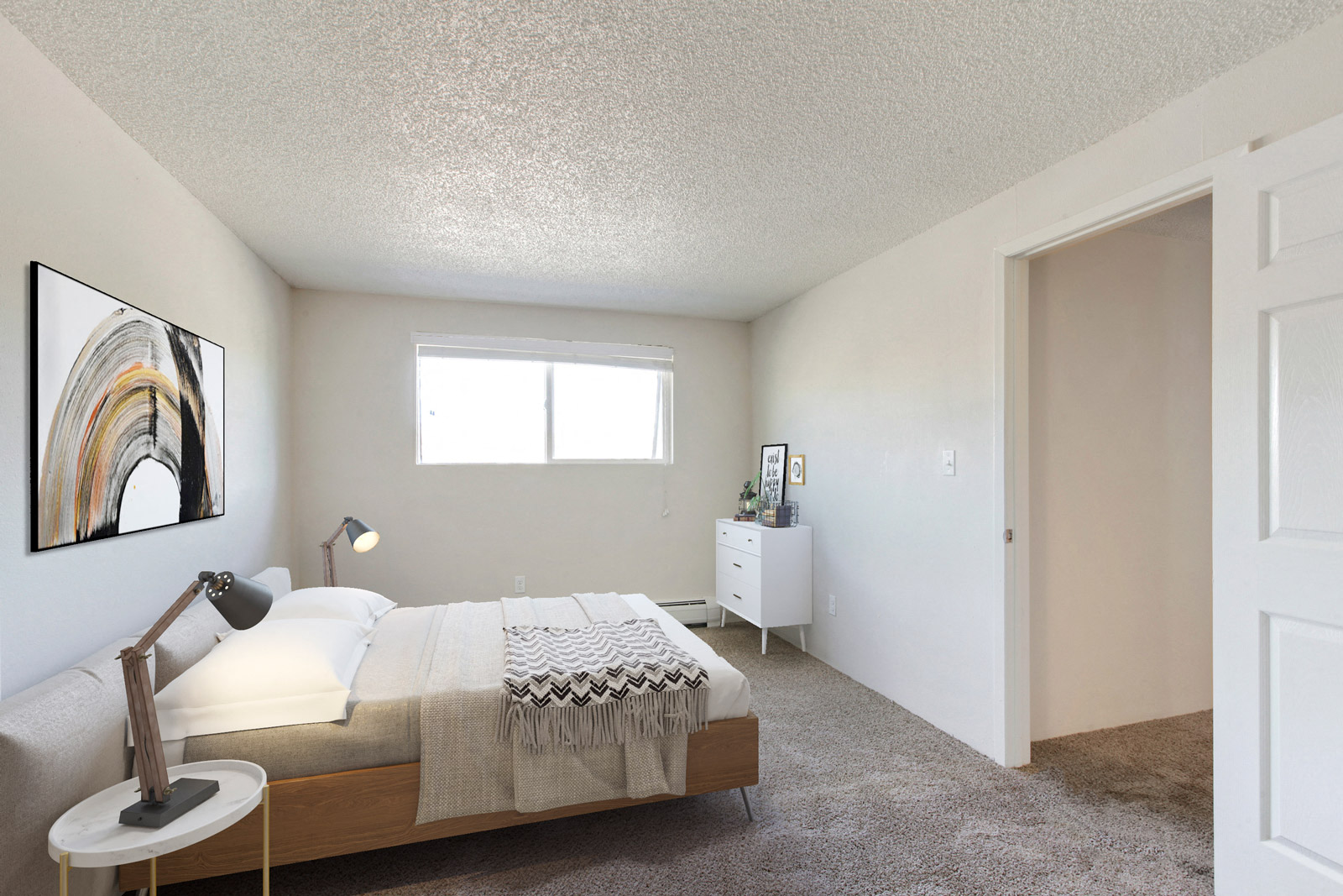 a bedroom with a bed and a dresser and a window