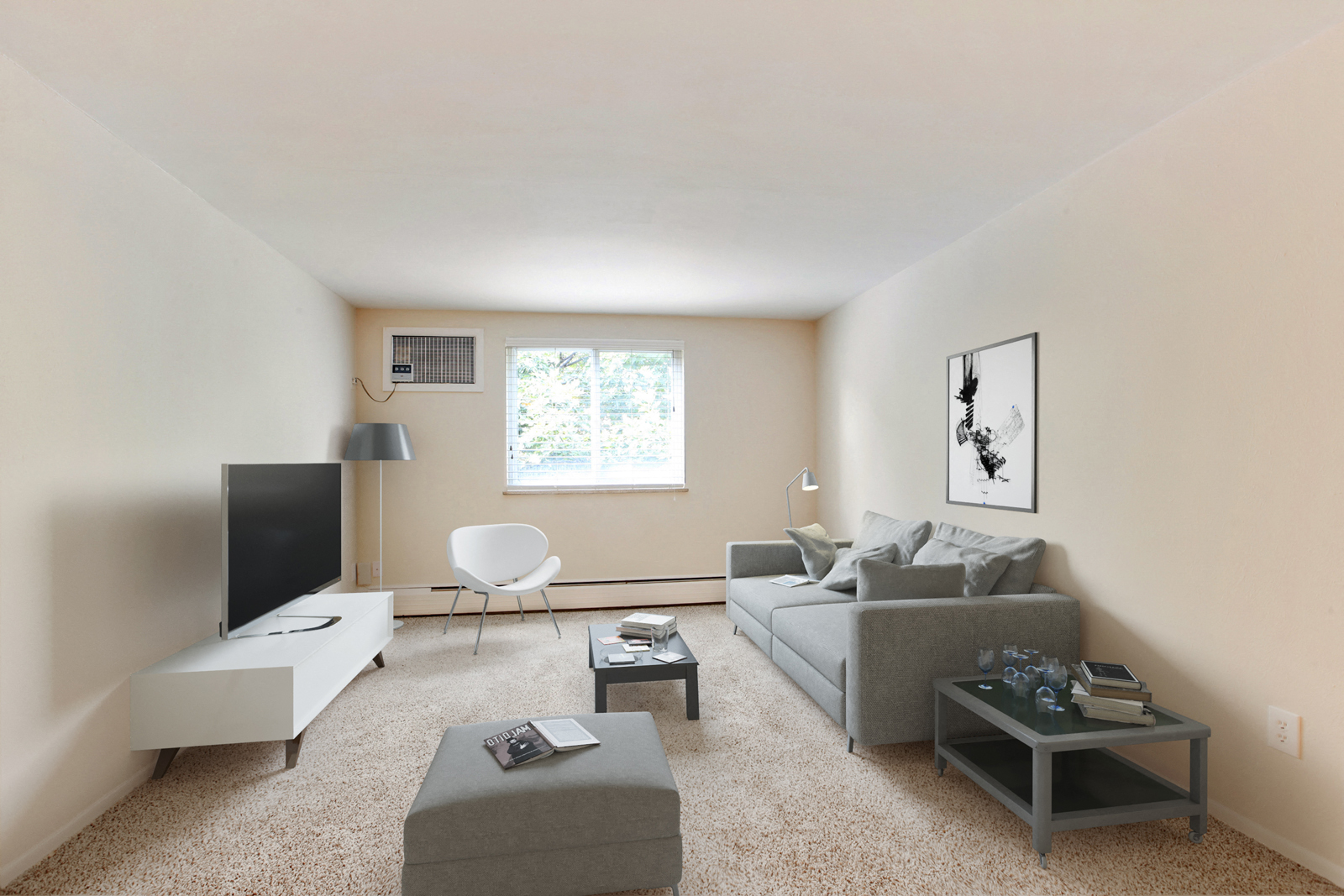 a living room with a couch and a tv