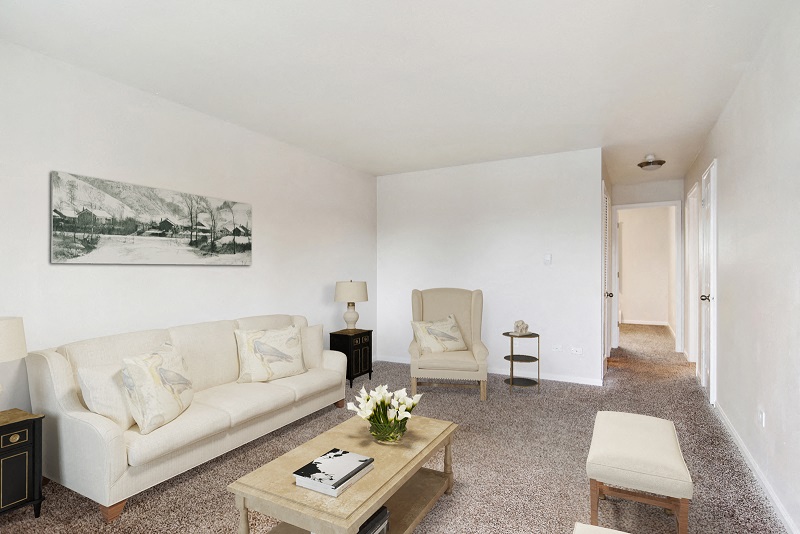 a living room with a couch and a coffee table