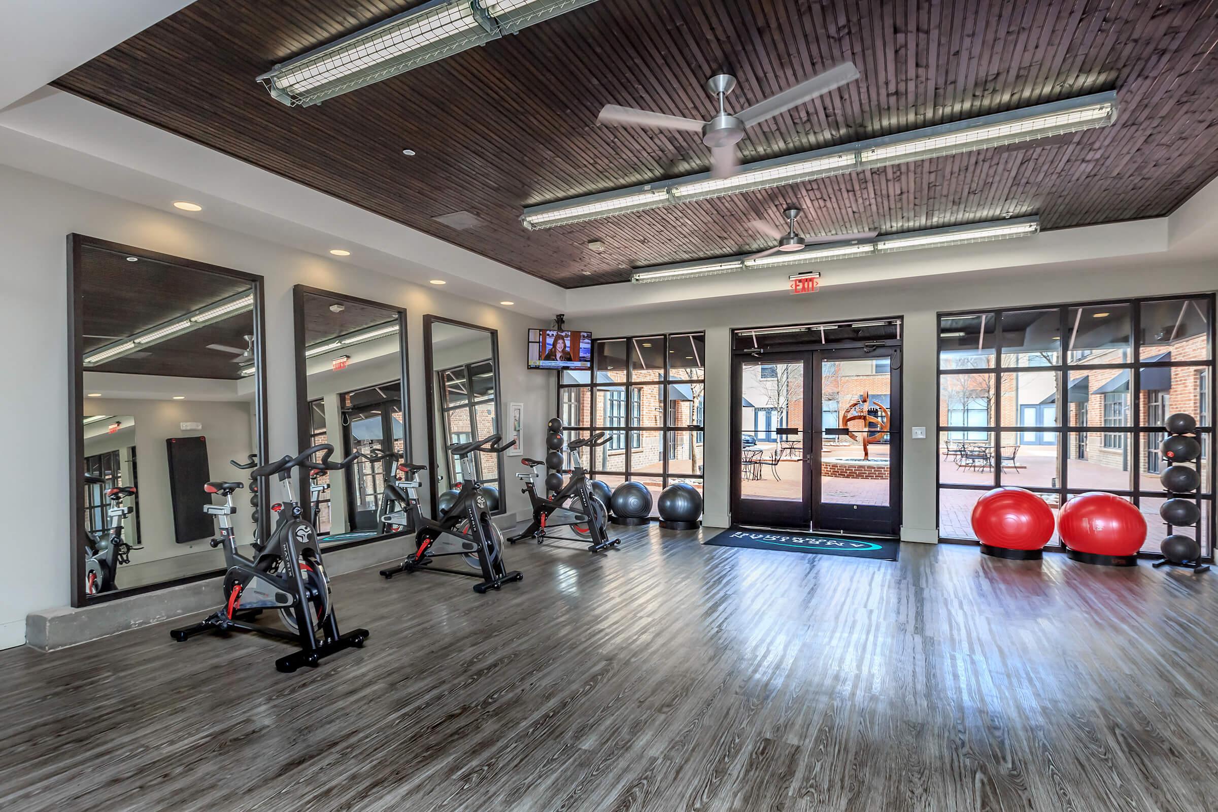 the gym at the flats at big tex apartments