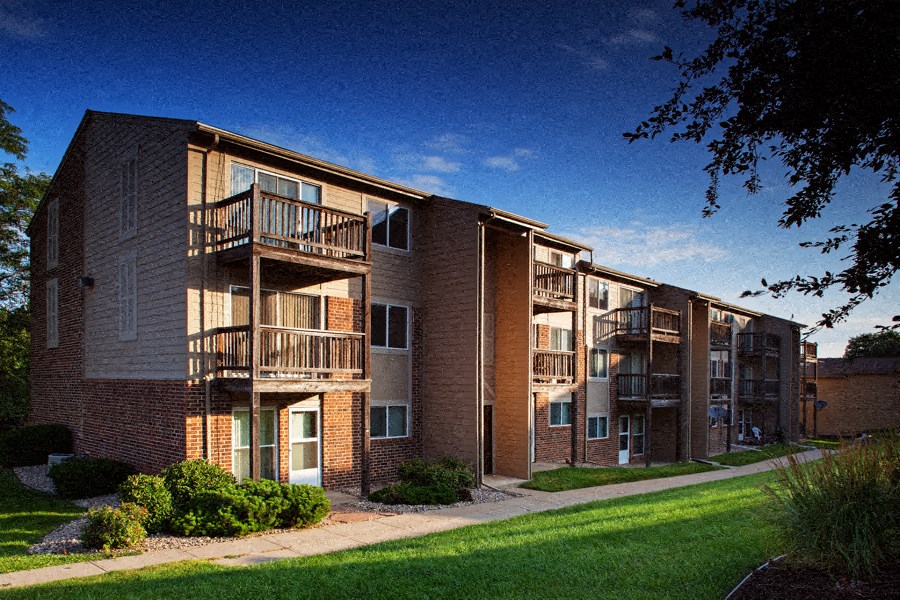 an exterior view of a building with balconies
