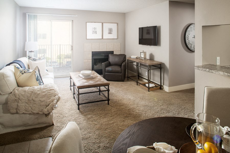 a living room with a couch and a table