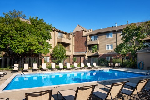 our apartments have a large pool and lounge chairs