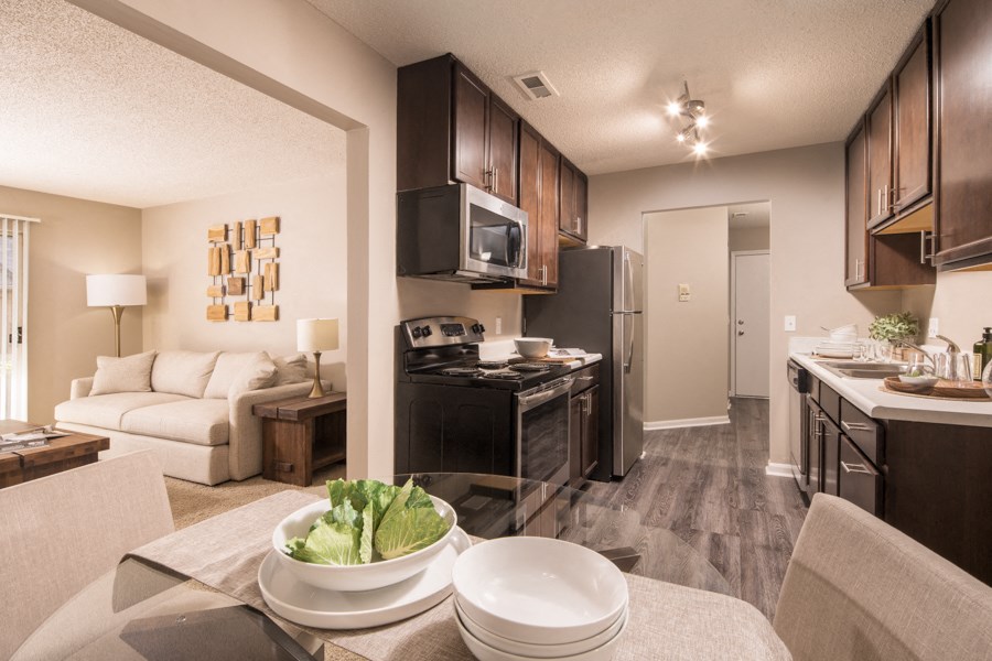 our apartments offer a kitchen and living room with a table