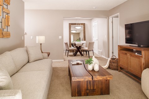 a living room with a couch and a coffee table