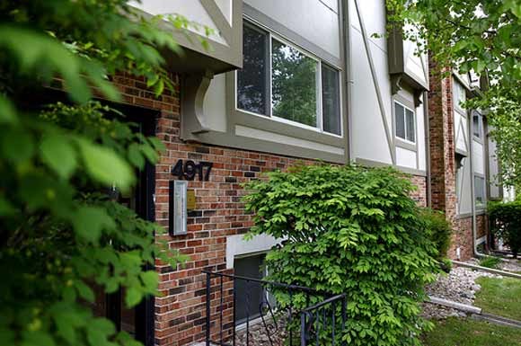 a brick building with a window on top of it
