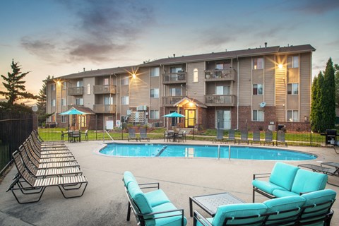 our apartments have a large pool and outdoor furniture
