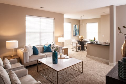 a living room with a couch and a table