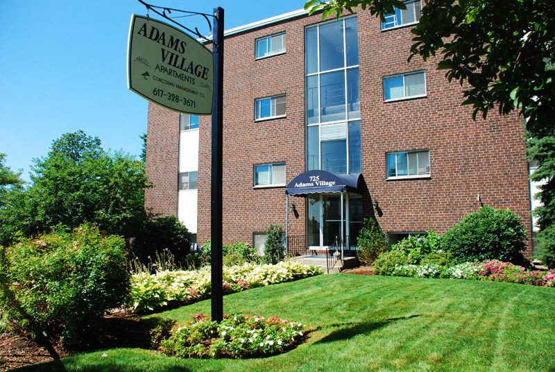 Adams Village Dorchester Apartments Green Grass Entrance