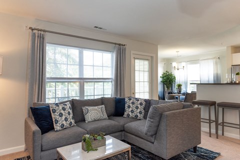 a living room with a couch and a coffee table