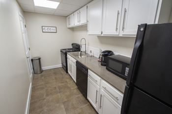 This is a photo of the kitchen in the resident social room at Park Lane Apartments in Cincinnati, OH.